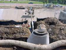Workers Install Sewer LInes